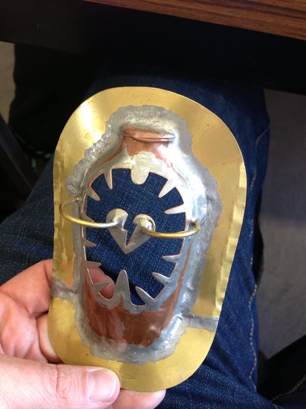 A metal sofubi paint mask.